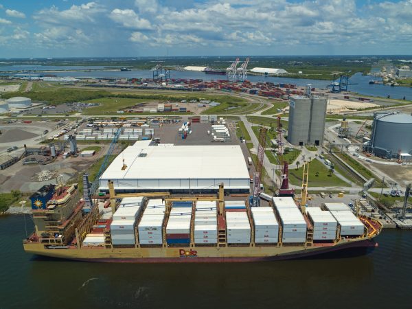 Aerial photograph of a ship unloading refrigerated cargo